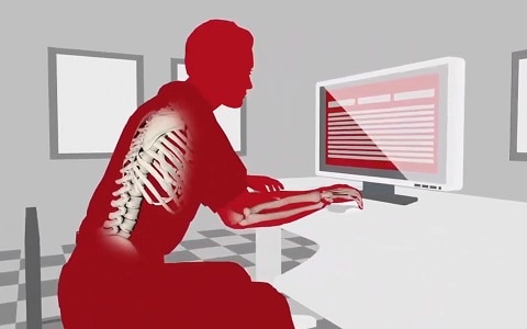 graphic of person sitting badly at desk revealing skeletal posture