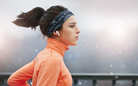 lady running with headphones