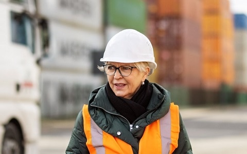 woman in hi vis and hard hat